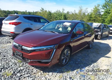2018 Honda Clarity Plug-In Hybrid z USA, uszkodzony, nr VIN JHMZC5F10JC011512
